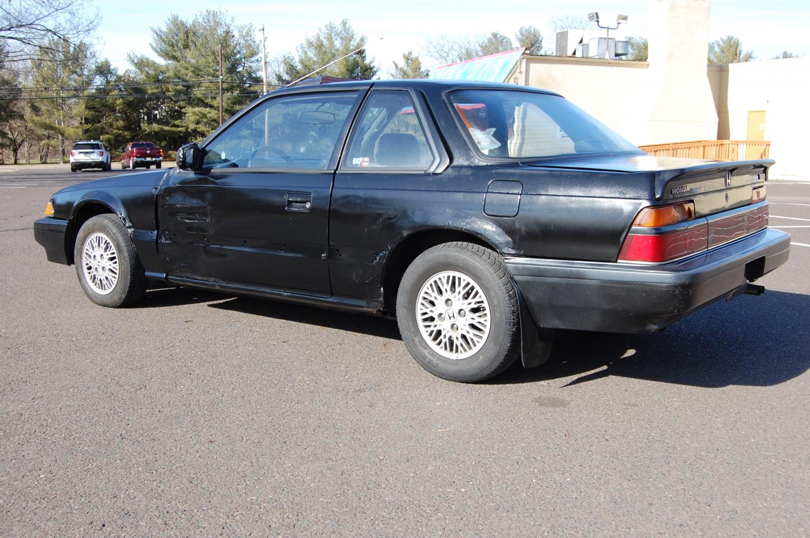 1987 Black /Gray Honda Prelude Si (JHMBA3248HC) with an 2.0L 4 cylinder engine, Automatic transmission, located at 6528 Lower York Road, New Hope, PA, 18938, (215) 862-9555, 40.358707, -74.977882 - Here we have a 1987 Honda Prelude SI with a 2.0L 4 cylinder putting power to the front wheels via an automatic transmission. Options include: gray cloth, power windows/locks/mirrors, AM/FM/TAPE radio, heat/AC, cruise control, tilt steering wheel, 13 inch alloy wheels, pop up headlights and a moon ro - Photo#4